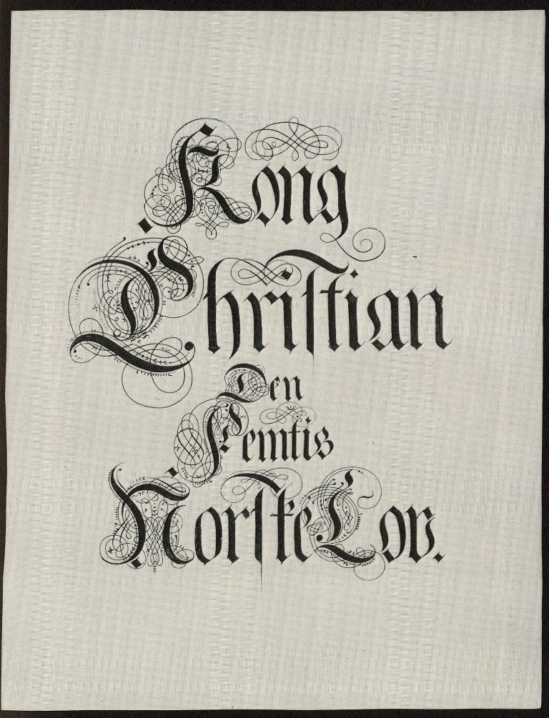 To av tittelblada frå boka Kong Christian Vs Norske Lov av 1687.